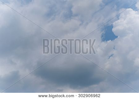 Beautiful Bright Blue Sky With White Fluffy Clouds On A Clear Sunny Day. Royalty High-quality Free S