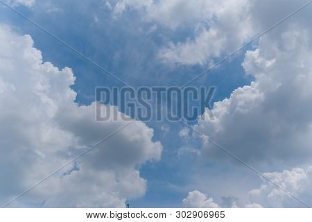 Beautiful Bright Blue Sky With White Fluffy Clouds On A Clear Sunny Day. Royalty High-quality Free S