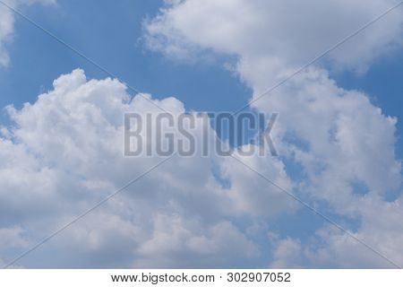 Beautiful Bright Blue Sky With White Fluffy Clouds On A Clear Sunny Day. Royalty High-quality Free S