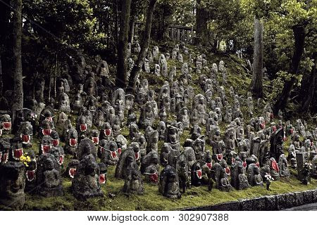 Rows Of Jizo Stone Statues On A Hillside In Kyoto, Japan At The Kiyomizu-dera Temple