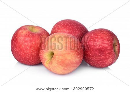 Pile Of Pink Lady Apple Isolated On White Background