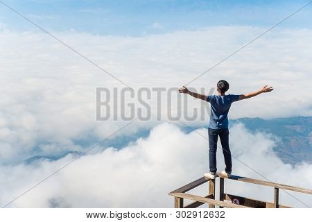 Young Man Dare To Standing On The Wooden Terraces In Kiw Mae Pan Boardwalk On Doi Inthanon, Chiang M