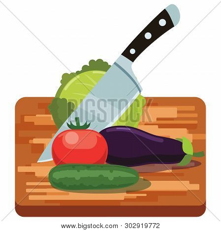 Fresh Vegetables On Woden Cutting Board With Knife
