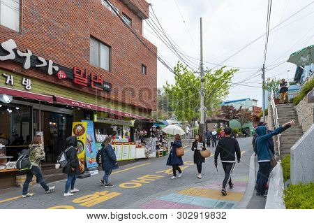 Busan, South Korea - April 2019: Tourists Visiting Gamcheon Culture Village, Famous Attraction With