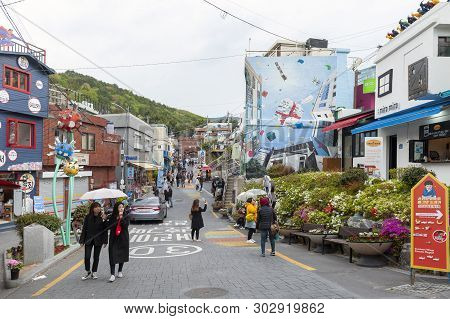 Busan, South Korea - April 2019: Tourists Visiting Gamcheon Culture Village, Famous Attraction With