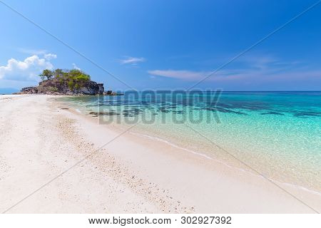 Tropical Beach Paradise And The Blue Sky At Khai Island In Satun Province , Thailand