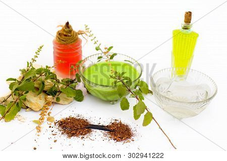 Basil Face Pack Isolated On White I.e. Sandalwood Powder Well Mixed With Tulsi,rose Water,olive Oil,