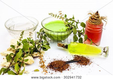 Tulsi Face Pack Isolated On White Consisting Of Sandal Wood Powder Well Mixed With Tulsi Leaves With