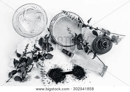 Tulsi Face Pack Isolated On White Consisting Of Sandal Wood Powder Well Mixed With Tulsi Leaves With
