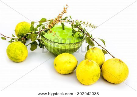 Lemon Face Pack Isolated On White I.e. Lime Juice Well Mixed With Tulsi Or Holy Basil's Juice.used F