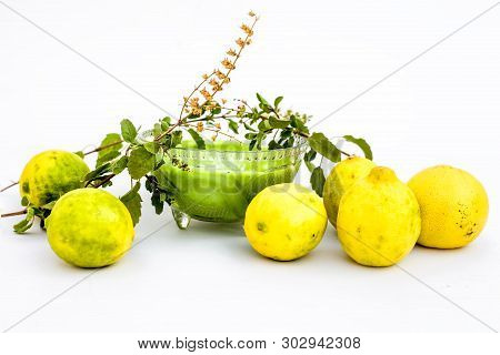 Lemon Face Pack Isolated On White I.e. Lime Juice Well Mixed With Tulsi Or Holy Basil's Juice.used F