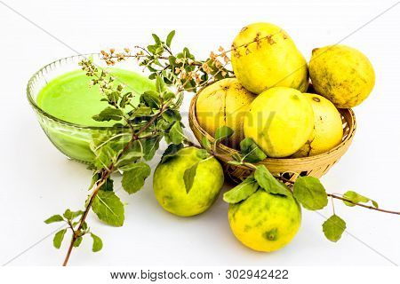 Lemon Face Pack Isolated On White I.e. Lime Juice Well Mixed With Tulsi Or Holy Basil's Juice.used F