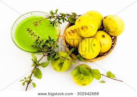 Lemon Face Pack Isolated On White I.e. Lime Juice Well Mixed With Tulsi Or Holy Basil's Juice.used F