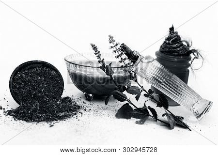 Tulsi Face Pack Isolated On White Consisting Of Sandal Wood Powder Well Mixed With Tulsi Leaves With
