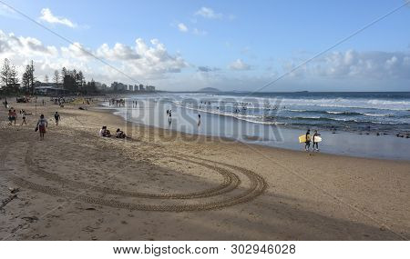 Alex Beach, Australia - Apr 21, 2019. People Relaxing At The Beach In Autumn Time Afternoon.  Alex I