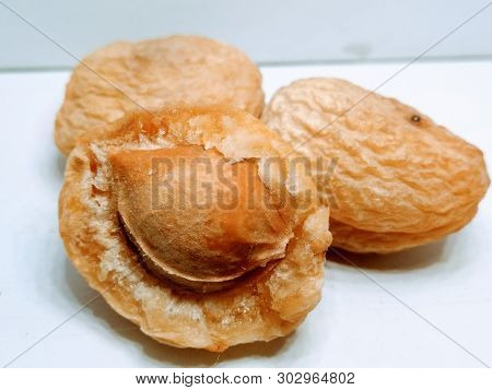 A Picture Of Almonds On White Background