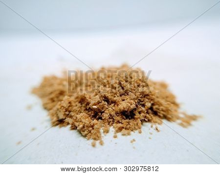 A Picture Of Coriander Powder On White Background