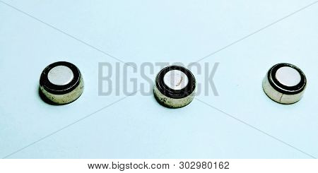 A Picture Of Macro Round Batteries On White Background