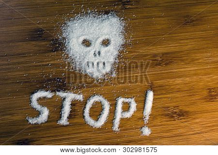 Sugar Skull Inscription Stop On The Table. Concept No Sugar Diet. Close Up, Selective Focus