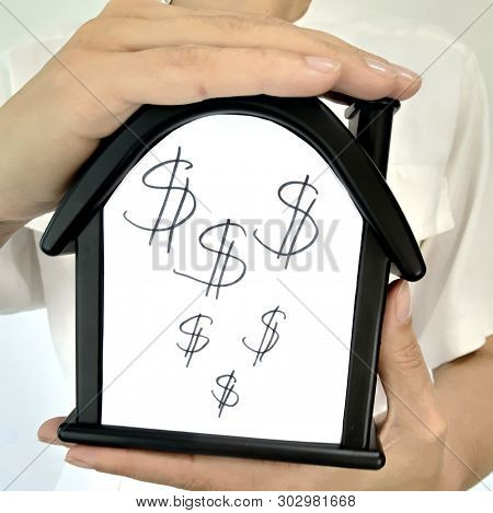 House With A Dollar Sign. Sale Of Immobility, Earnings At Home