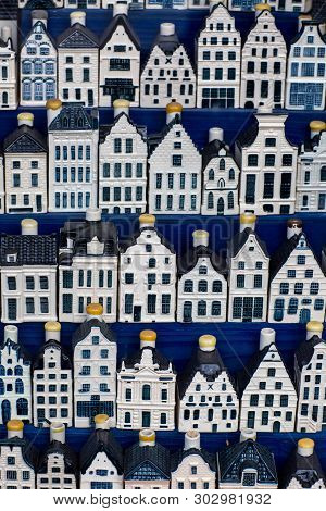 Traditional Souvenirs From Amsterdam Rows Of Delftware Porcelain Dutch Style Houses. Shop Display