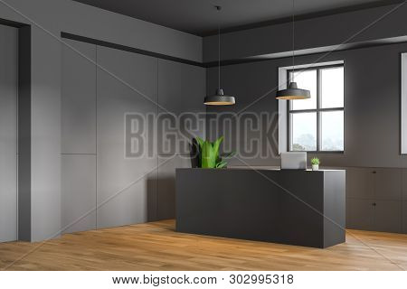 Reception Desk In Gray Office Corner