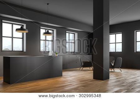 Reception Desk In Gray Office With Lounge