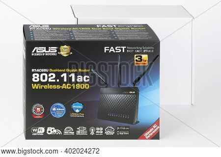 Brnenec, Czech Republic - January 31, 2020: Paper Box, Inside Wifi Router Asus Rt-ac68u, Wireless De