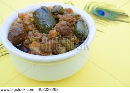 Indian Gujarati Special Dish Variety Undhiyu Or Undhiya Closeup With Yellow Background, Background D