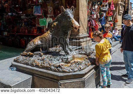 Fontana Del Porcellino / Florence / Italy - July 05, 2019: People Visiting The Bronze Statue Of The