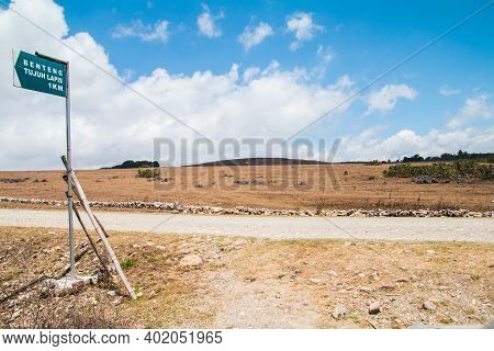 Sumba,indonesia-september 2020: Empty Countryside Road With Sign Board In Sumba, East Nusa Tenggara,