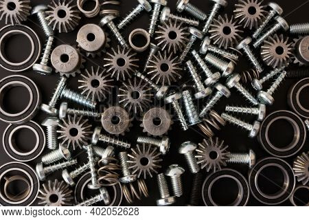Background With Mechanical Components, Gears, Springs, Screws, Industrial Objects