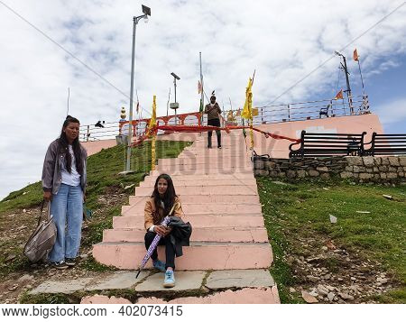 Mandi, Himachal Pradesh, India - July 05 2020: People Sitting In Stairs Of Shikari Devi Temple Which