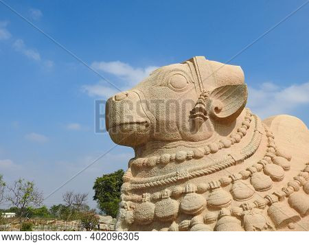 Closeup Of Beautiful Huge Or Big Lord Shiva Vehicle Nandi, Basava In A Blue Sky Background