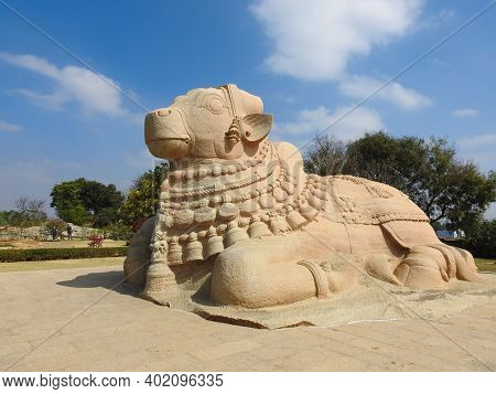 Closeup Of Beautiful Huge Or Big Lord Shiva Vehicle Nandi, Basava In A Blue Sky Background