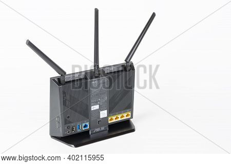 Brnenec, Czech Republic - January 31, 2020:rear View Of  Wi-fi Router Asus Rt-ac68u With  Three Ante