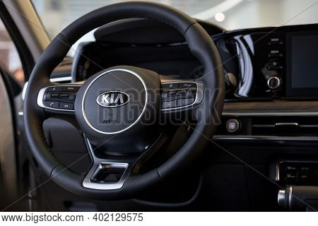 Russia, Izhevsk - December 28, 2020: Kia Showroom. Steering Wheel And Interior Of New K5 Car Busines