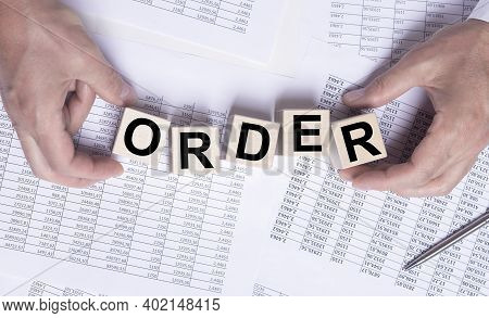 Order Word Inscription On Wooden Cubes. Business And Law Concept