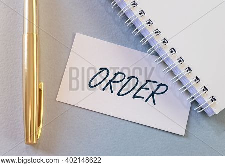 Order Word Inscription On Paper. Business And Law Concept