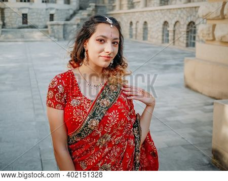 Beautiful Ethnic Indian Saree. Young Woman In Red, Colorful, Sensual, Wedding And Very Feminine Outf