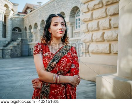 Beautiful Ethnic Indian Saree. Young Woman In Red, Colorful, Sensual, Wedding And Very Feminine Outf