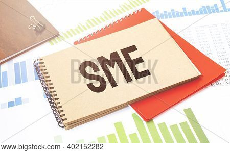 Notepad With Text Sme. Diagram, Red Notepad And White Background