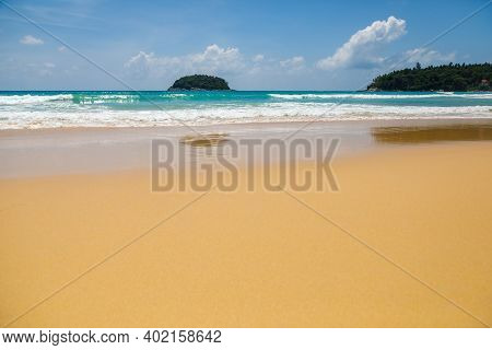Seascape, Small Waves With White Foam At The Top Against The Background Of Blue Water. Low, Dense Cl