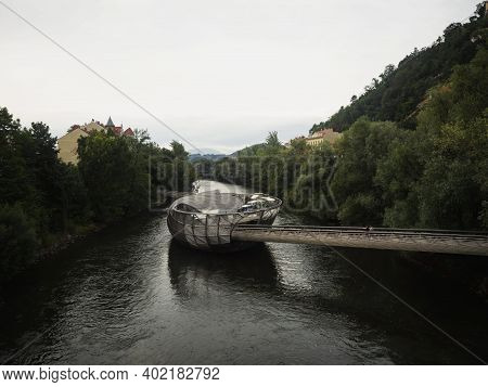 Panorama Of Murinsel Artifical Island Building Cafe Amphitheatre Sea Shell Footbridge On Mur River G