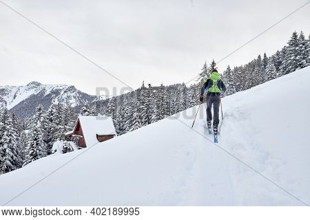 A Man On A Lonely Ski Tour In The Alps