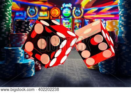 Casino rolling dice and chips on the gamblingtable