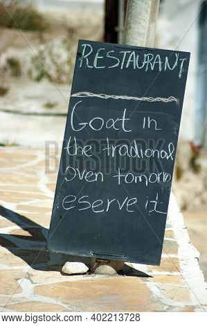 Anafi Island Greece. Taverna Menu On A Blackboard. Simple, Authentic Nutritious Local Food Available