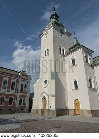 Ruzomberok, Slovakia, August 30, 2020: View Of Baroque Church St. Andrew, A Historical Building Fars