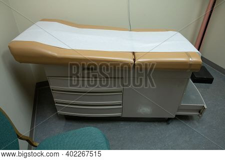 Empty Examination Table Has Been Cleaned And Ready For Your Exam