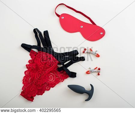 Black Clitoral Vaginal Vibrator Red Lace Panties Leather Mask And Nipple Clamps